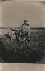 Hunter with dog and geese Postcard