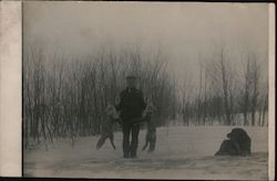 Real photo view of man holding up two foxes - "I finished this myelf" Postcard