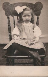 Little Girl Sitting in Chair Postcard