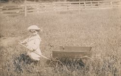 Child with "20th Century" Toy Wagon Postcard