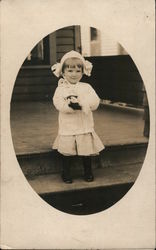 Child Standing on Steps Postcard