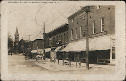 Street Scene, Frisbie & Sawyer Opera House Postcard