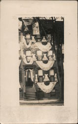 Exterior of a Home Decorated with Draped Bunting and Flags Postcard