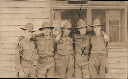 Five Men In Uniform Standing in front of a Building with Arms Around Each Others' Shoulders Postcard