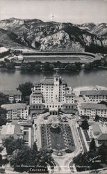 Vista of Broadmoor Hotel, Lake Stadium and Mountains Postcard