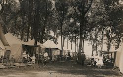 People gathered in a camp, probably Kansas Postcard