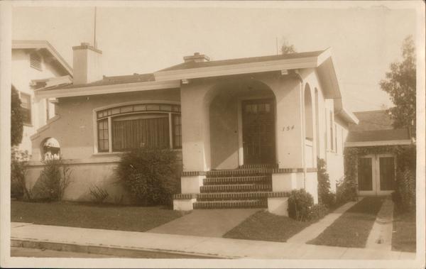 154 Eastwood Drive, mission style home with arched window and tiled patio steps San Francisco California