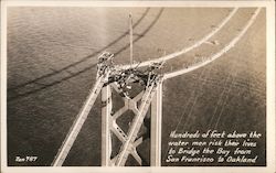 Hundreds of feet above the water men risk their lives to Bridge the Bay from SF to Oakland Postcard