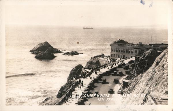 Cliff House and Seal Rocks with a ship in the distance San Francisco California