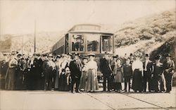 Group of People Standing in front of a Trolley Postcard