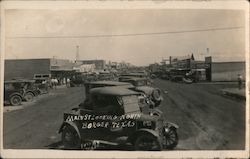 Main Street Looking North, long row of Model Ts Borger, TX Chase Postcard Postcard Postcard