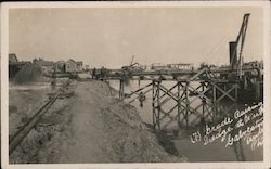 Geade Raising Dodge at WHarf Postcard