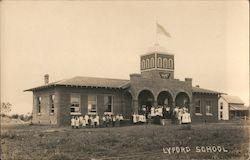 Lyford School, students gathered outside school building Postcard