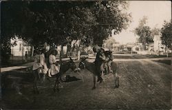 Children on Donkeys in Street Postcard