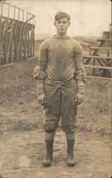 Football Player Standing in Front of Bleachers Postcard