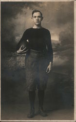 c1910 Boy Cradling Football Under Arm, Studio Postcard