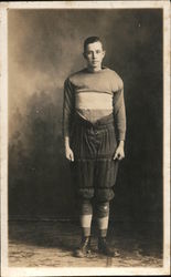 Football Player in Padding and Striped Shirt Postcard