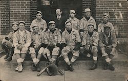 Baseball Team Pictured Wearing Uniforms Displaying "L$" (11 players/1 Manager) Postcard