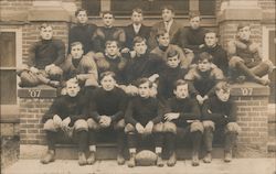 1907 Football Team Seated on Steps Postcard