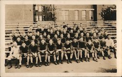 Football Team Posing on Building Steps Postcard