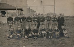 c1910 Football Team Posing in Field Postcard