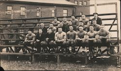 c1910 University of New Hampshire Football Team Seated in Bleachers Postcard