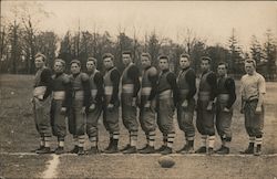 Football Team Lined Up in Field Postcard