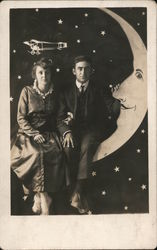 Man and Woman on Paper Moon, Stars, Airplane Postcard