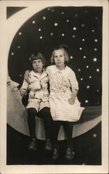 Two Children on Paper Moon Postcard