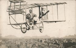 Man and child posing in airplane Studio Photo Postcard