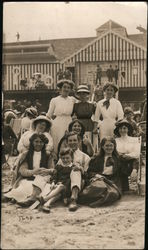 Family Sitting on Sand at Beach - Chiswick or Cliftonville? Postcard