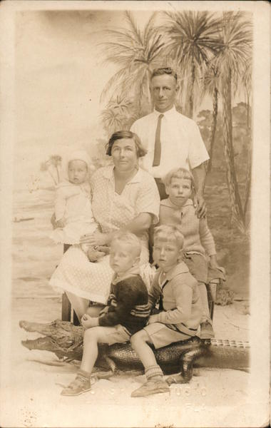 Family posed with Alligator Studio Photo Florida Alligators