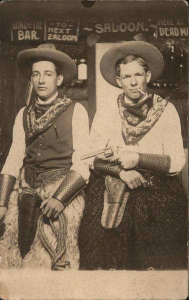 Two Men dressed as Cowboys in a Bar, Wooly Chaps Studio Photos