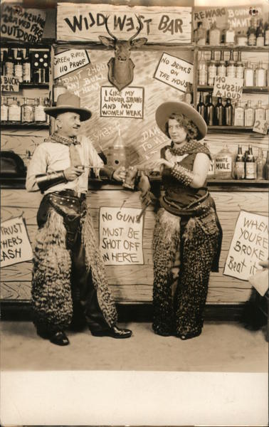 Man & Woman dressed as Cowboys in Wild West Bar, Wooly Chaps