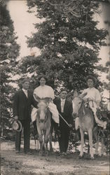 Two Couples Pose with Burros on the Manitou Incline R.R. Postcard