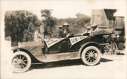 Men in a Car on the US Mexico Boarder Postcard