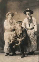 Cowboy Scene with Wooly Chaps, Guns c1915 Postcard