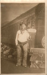Man Dressed as Cowboy Wooly Chaps "Leaving Denver" Postcard