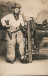 Man Dressed as Cowboy Wooly Chaps Rifle Saddle Postcard