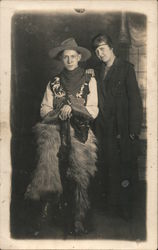Cowboy with Wooly Chaps & Woman Postcard