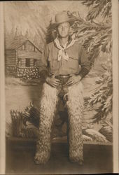 Man Dressed as a Cowboy Holding His Belt, Wooly Chaps Postcard