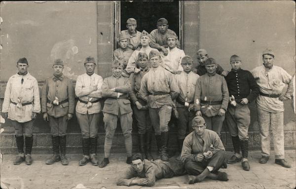 Group of Soldiers in Front of a House Military