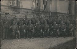 Group of German Soldiers in Front of a House Postcard