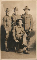 Group of Soldiers in a Photo Studio Postcard