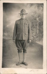 Lone Soldier - Standing in a Photo Studio, WWI-era Postcard