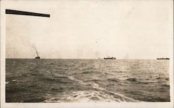 Warships Waiting in the Background Postcard