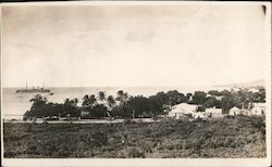 A Lone Warship Sailing in the Beach Postcard
