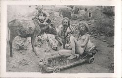 A Hindu fakir sitting on a bed of nails Postcard