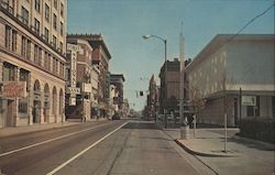 Looking East on Main Street Business Section Postcard