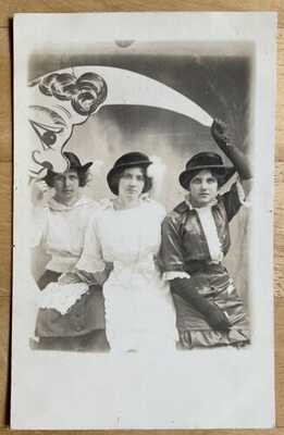 Carnival/Studio View RPPC Two Women Sitting On Right Facing Paper Moon